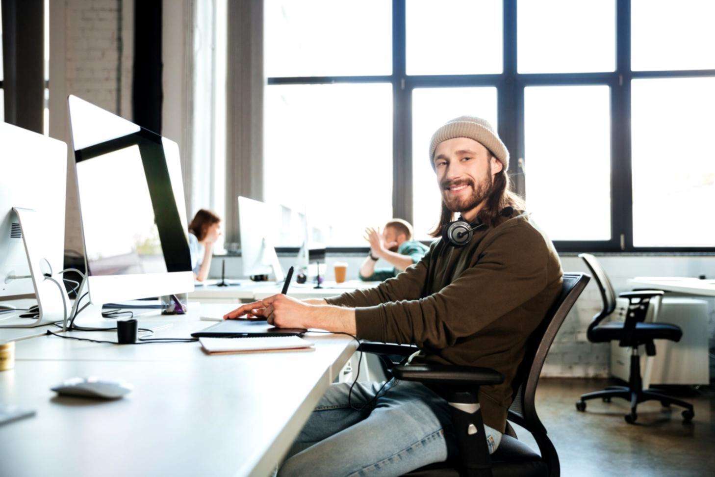 Modern database monitoring setup showing performance metrics and query optimization results on multiple screens